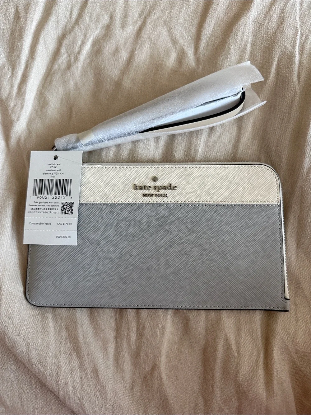 kate spade Two-Tone Gray and White Leather Wristlet